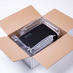 MINI PAK'R® supertube used to block and brace a product inside a box.